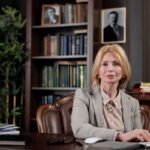 businesswoman-sitting-in-her-office-4427506